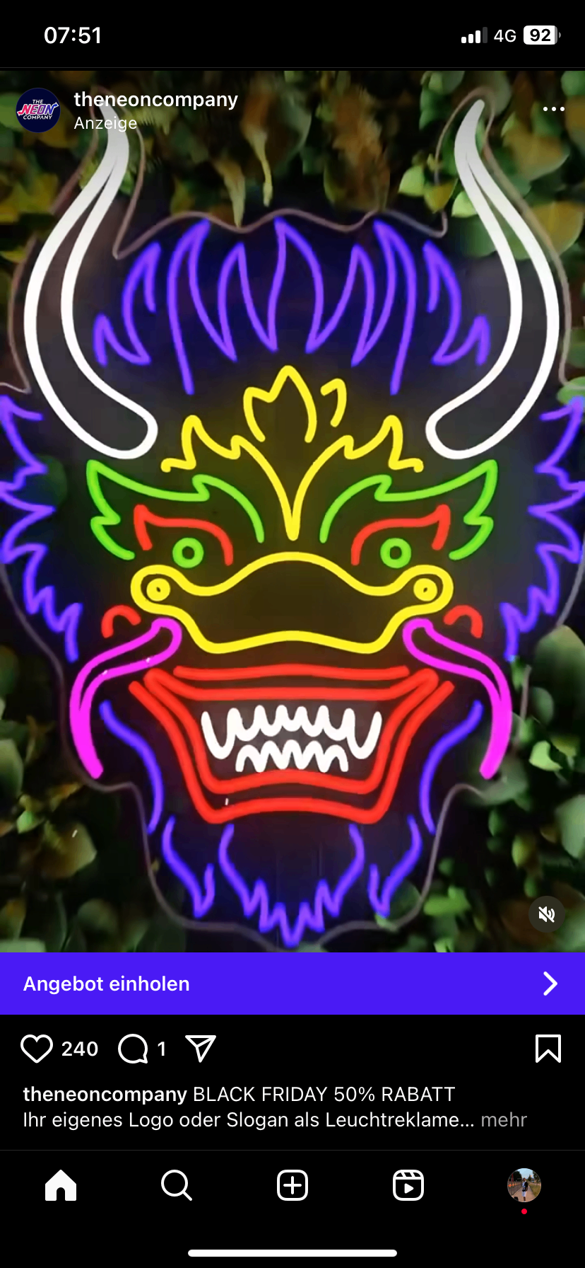Original multicolor neon tube dragon face composed of curved lines forming horns, eyes, decorative forehead shapes, and an open mouth with white teeth logo featuring black, purple, yellow colours